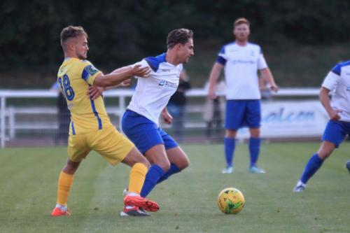 Stortfords Ben Worman (L) and Enfields Sam Youngs