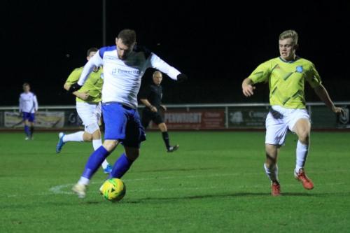 Billy Bricknell shoots  The shot was cleared but bundled in by Bobson Bawling for Enfields fourth goal