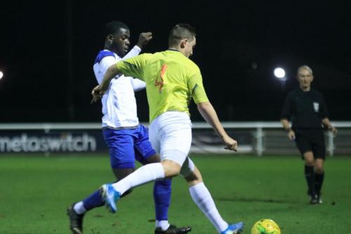 Staines George Ede (4) clears from Junior Mubiayi