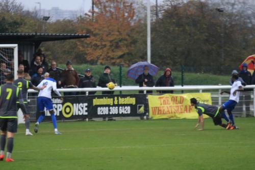 Enfields Bobson Bawling (R) finds the net but the referee diallows the doal afgter initially appearing to give it
