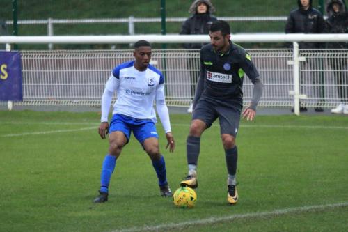 Enfields Jon Muleba (L) and Thatchams Felipe Barcelosx