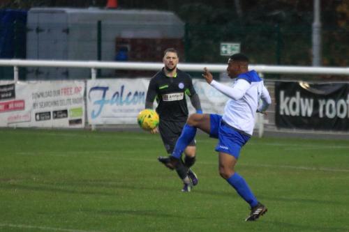 Enfields Jon Muleba clears from Kyle Tooze