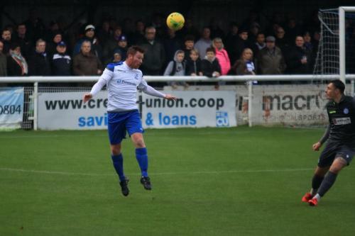 Enfields Marc Weatherstone heads the ball past George Jeacock