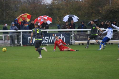 Enfields Muhammadu Faal (10) rolls the ball past keeper Archie Matthews but narrowly wide of the far post