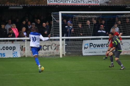 Enfields Muhammadu Faal breaks into the box but Zack Westlake (5) gets across to block his shot