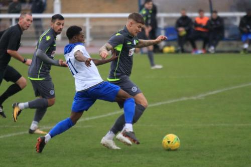 Enfields Samson Esan (11) challenges Matt Partridge
