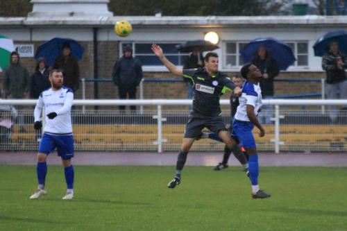 Enfields Samson Esan (R) challenges Zack Westlake