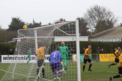 A header flies just wide of the Folkestone net