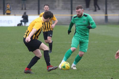 Enfield's Billy Bricknell (R) and Folkestone's Matt Newman
