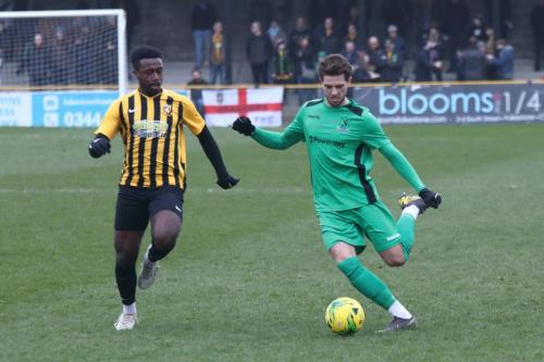 Enfield's Josh Urquhart (R) and Folkestone's Ira Jackson
