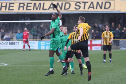 Enfields Shaun Okojie (L) and Folkestone's Callum Davies