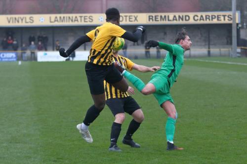 Folkestone's Ira Jackson (L) and Enfield's Sam Youngs
