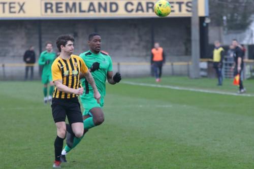 Folkestone's Matt Newman (L) and Enfield's Shaun Okojie