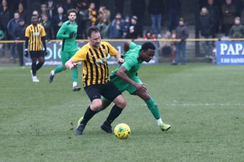 Folkestone's Micheal Everitt (L) and Enfield's Ken Charles