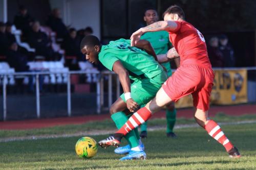 Enfields Junior Mubiayi (L) and Hornchurchs Matt Johnson