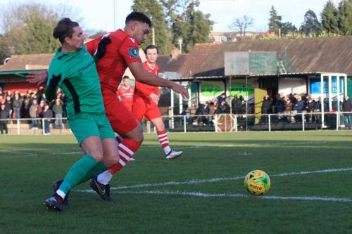 Enfields Sam Youngs (L) and Hornchurchs Nathan Cooper