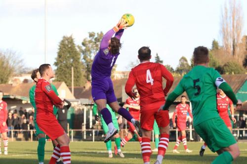 Hornchurch keeper Joe Wright catches a crosss