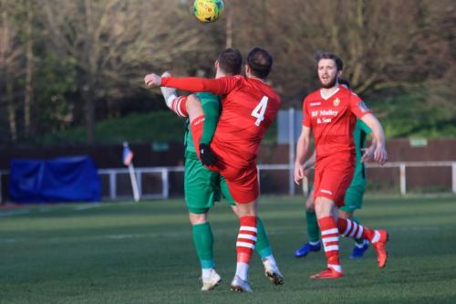 Hornchurchs Arthur Lee (4) is penalised for a high foot against Billy Bricknell