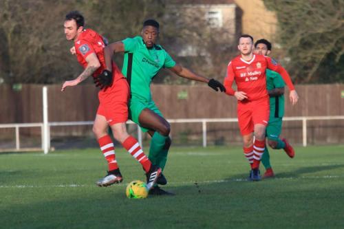 Hornchurchs Matt Johnson (L) and Enfields Shaun Okojie