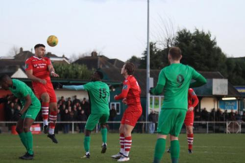 Hornchurchs Nathan Cooper heads clear