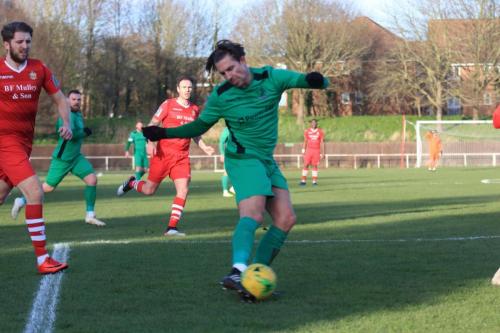 Sam Youngs shoots across the face of goal