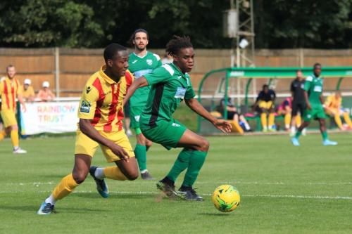 Enfields Ken Charles (L) and Leatherheads Izunna Ikebuasi