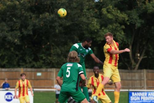 Enfields Marc Weatherstone (R) heads past Jerry Nnamani but off target