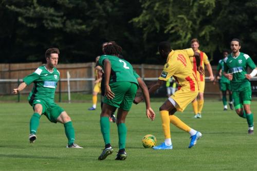 Enfields Muhammadu Faal (10) and Leatherheads Craig McGee (R) and Izunna Ikebuasi
