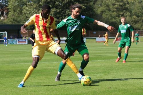 Enfields Muhammadu Faal (L) and Leatherheads Daniel Gallagher