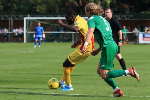 Enfields Muhammadu Faal (L) and Leatherheads Will Salmonx