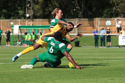 Enfields Muhammadu Faal is stopped by Jerry Nnamani (6) and Will Salmon