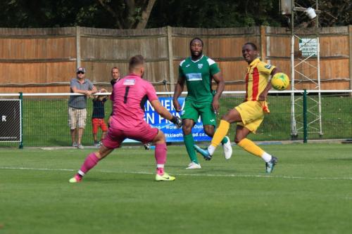 Ken Charles face (R) shows hes scuffed his shot allowing Leatherhead keeper Zaki Oualah to save