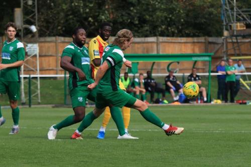 Leatherheads Will Salmon (R) clears from Muhammadu Faal