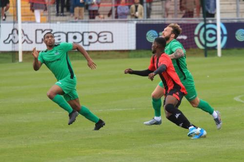 Enfields Jon Muleba (L) and Scott Thomas and Lewes Jordy Mongoy