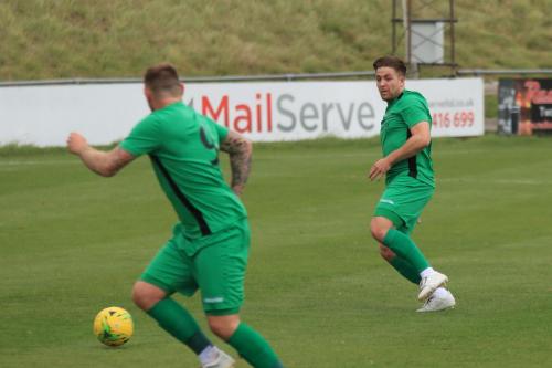 Enfields Lewis Taaffe (R) tries to pick out Billy Bricknell