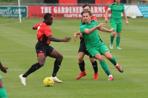 Enfields Sam Youngs (R) and Lewes Michael Dome Bemwin