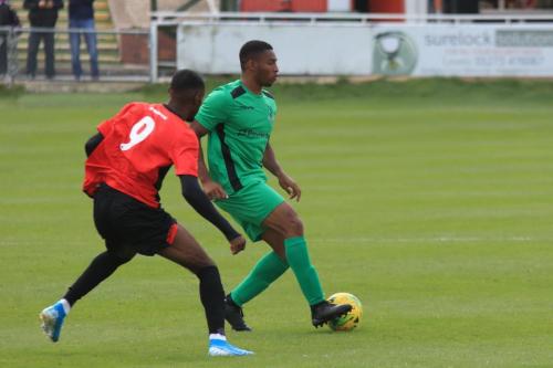 Lewes Jordy Mongoy (L) and Enfields Jon Muleba