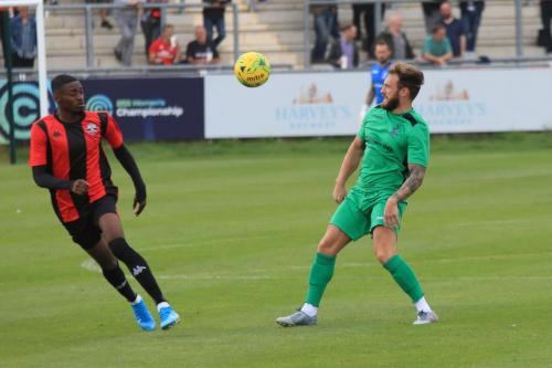 Lewes Jordy Mongoy (L) and Enfields Scott Thomas