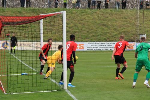 Lewes keeper Nathan Stroomberg saves from Ken Charles