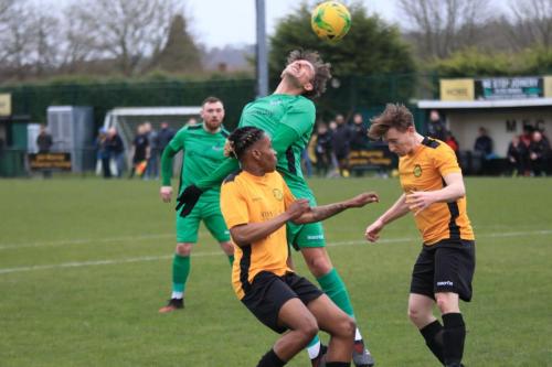 Enfields Sam Youngs and Mersthams Oshane Stewart and Eddie Dines (R)