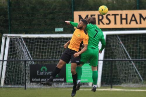 Mersthams Ellis Brown (L) and Enfields Lewis Taaffe
