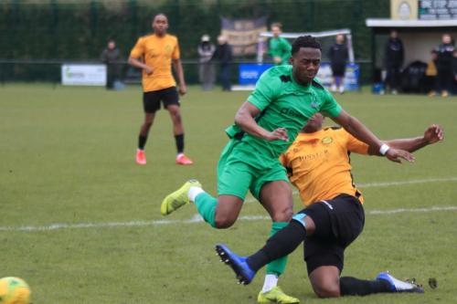 Mersthams Emmanuel Fernandez (amber) clears from Ken Charles