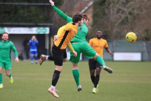 Mersthams James OHalloran (L) and Enfields Marc Weatherstone