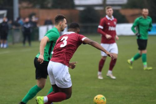 Enfields Lyle Della-Verde (green) and Potters Bars Dwight Pascal
