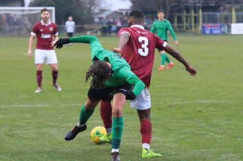 Enfields Sam Youngs (L) and Potters Bars Dwight Pascal