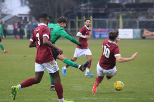 Enfields Sam Youngs shoots past Bradley Sachs (10) attempted block