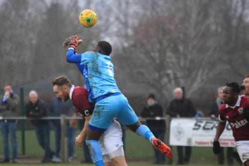 Potters Bar keeper Ravan Constable fumbles under pressure from his captain James Budden
