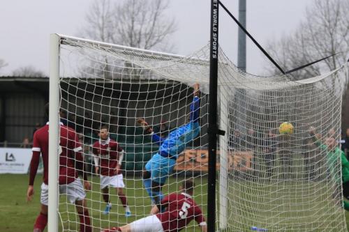 Potters Bars James Budden (5) gives Enfield the lead with his attempt to clear from Billy Bricknells cut-back