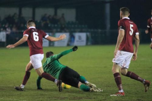 Potters Bars Will Wambeek (6) concedes a free kick for a foul on Billy Bricknell