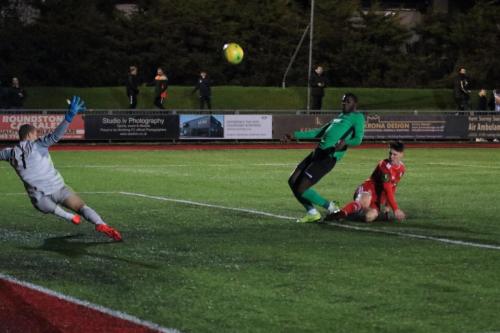 Junior Mubiayi shoots over the bar